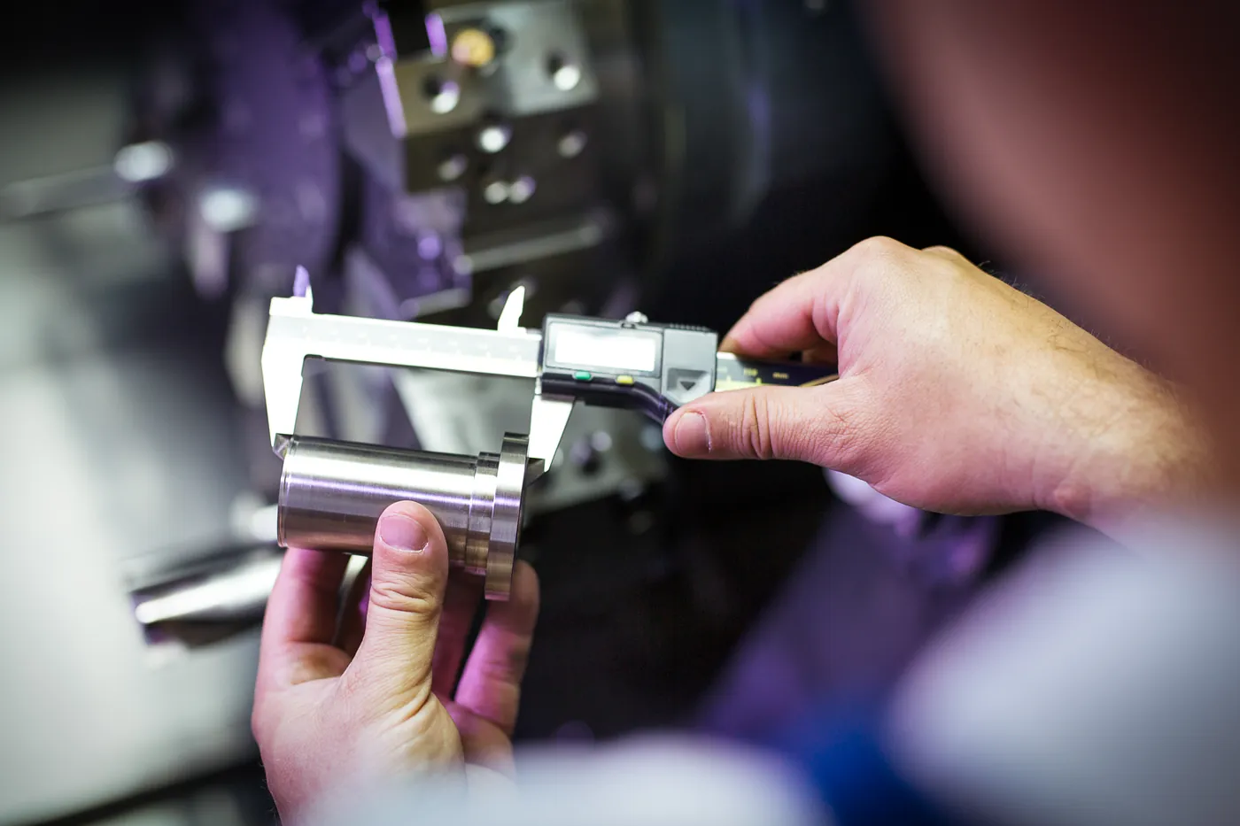 Technical inspector performing dimensional checks on fabricated equipment