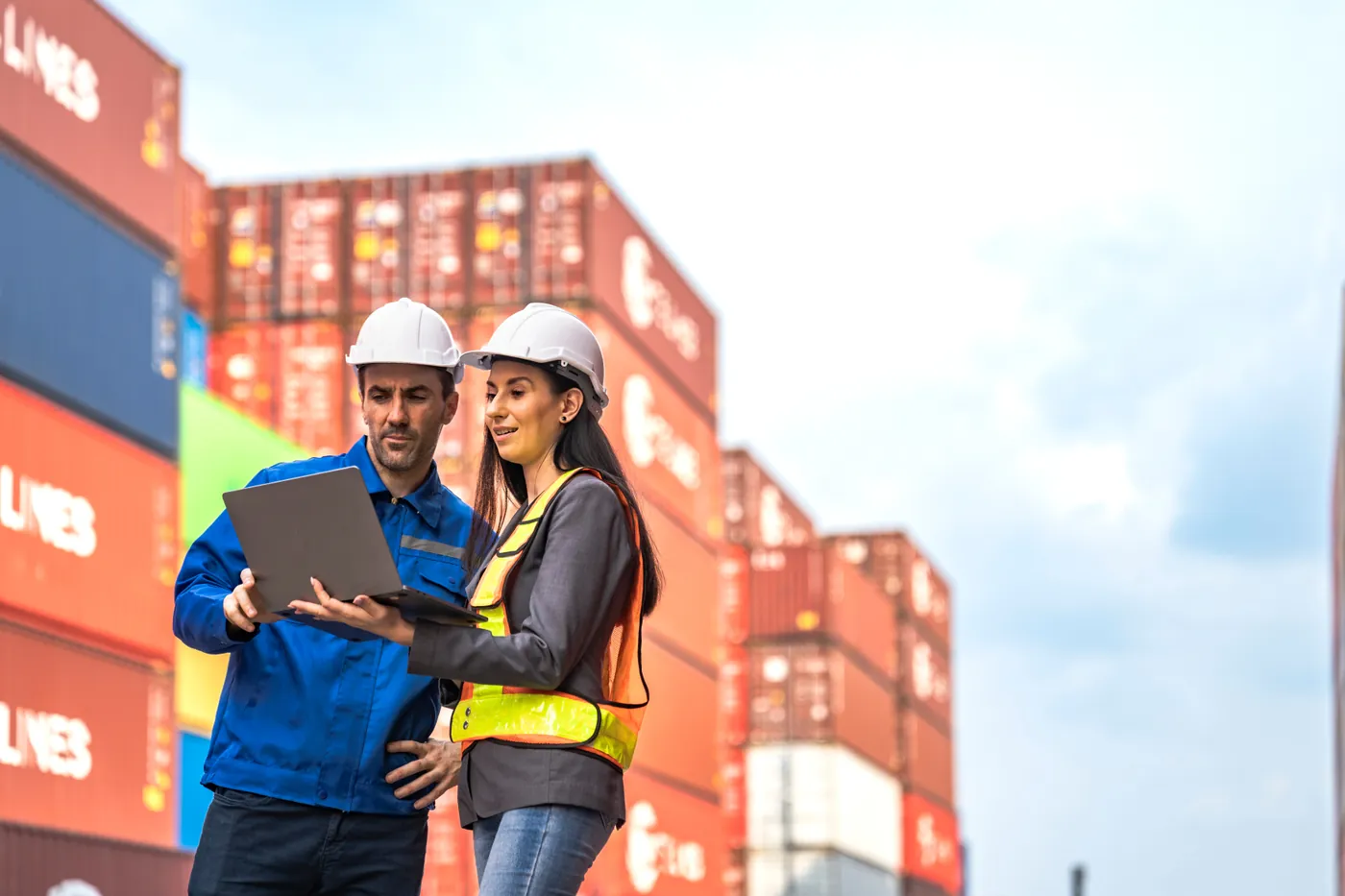 Surveyor sampling bulk cargo for independent laboratory analysis