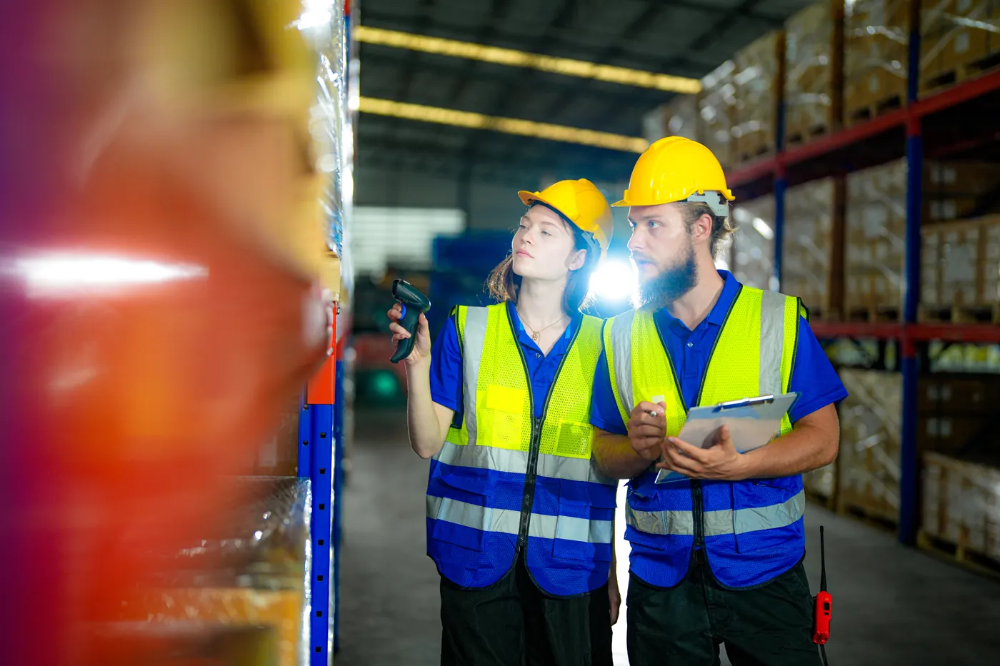 Inspector applying AQL sampling to a packed production batch